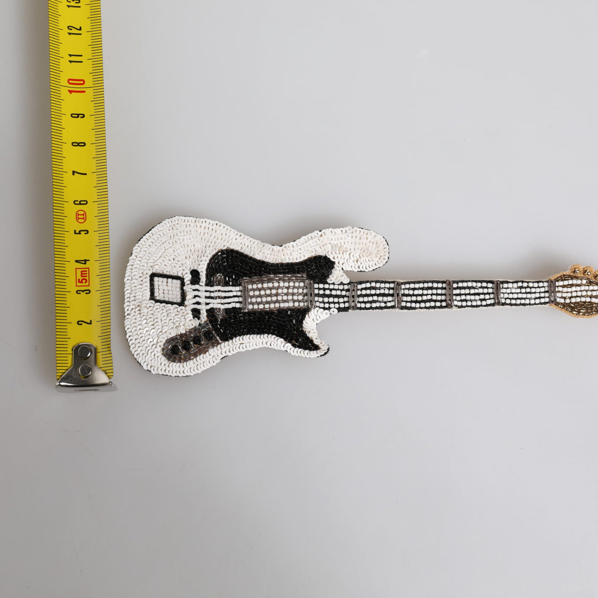 Dolce &amp; Gabbana Gold Brass Logo Beaded Guitar Pin Brooch