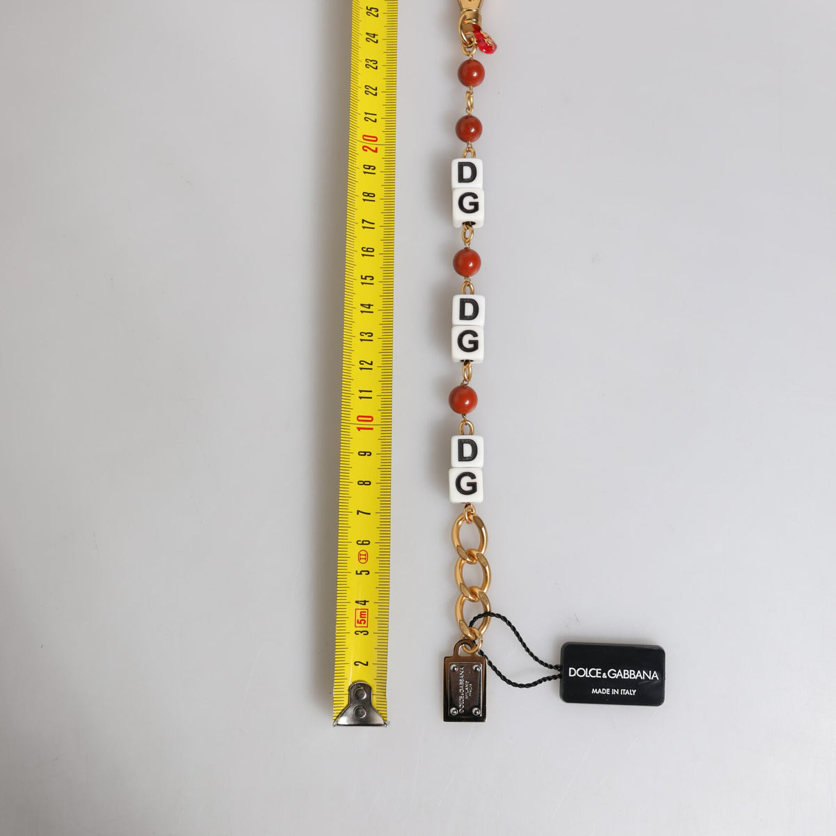 Bracelet Dolce & Gabbana "Chaîne Dorée : Dés DG, Perles & Cœur Rouge"